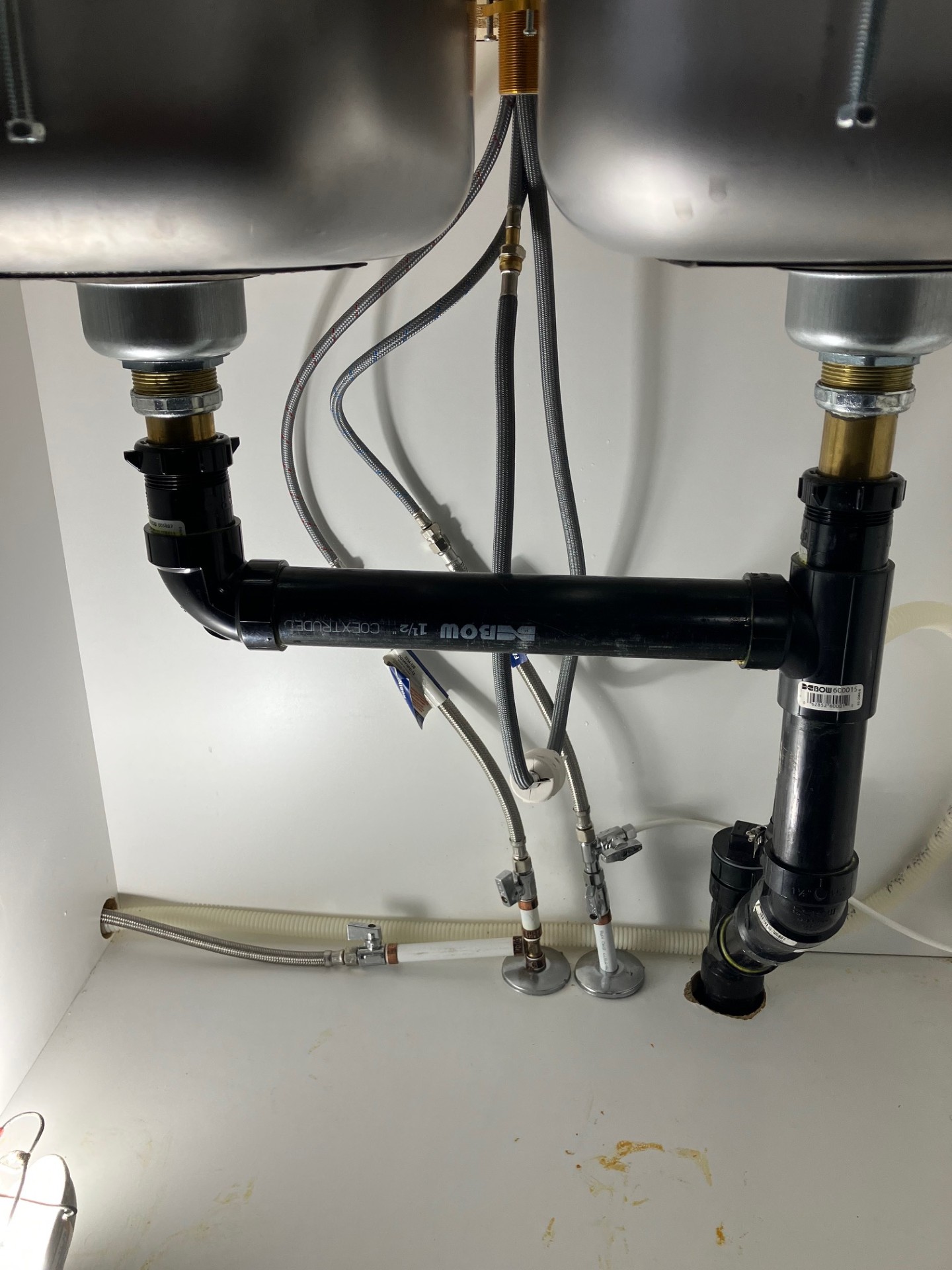 Professional under-sink plumbing installation